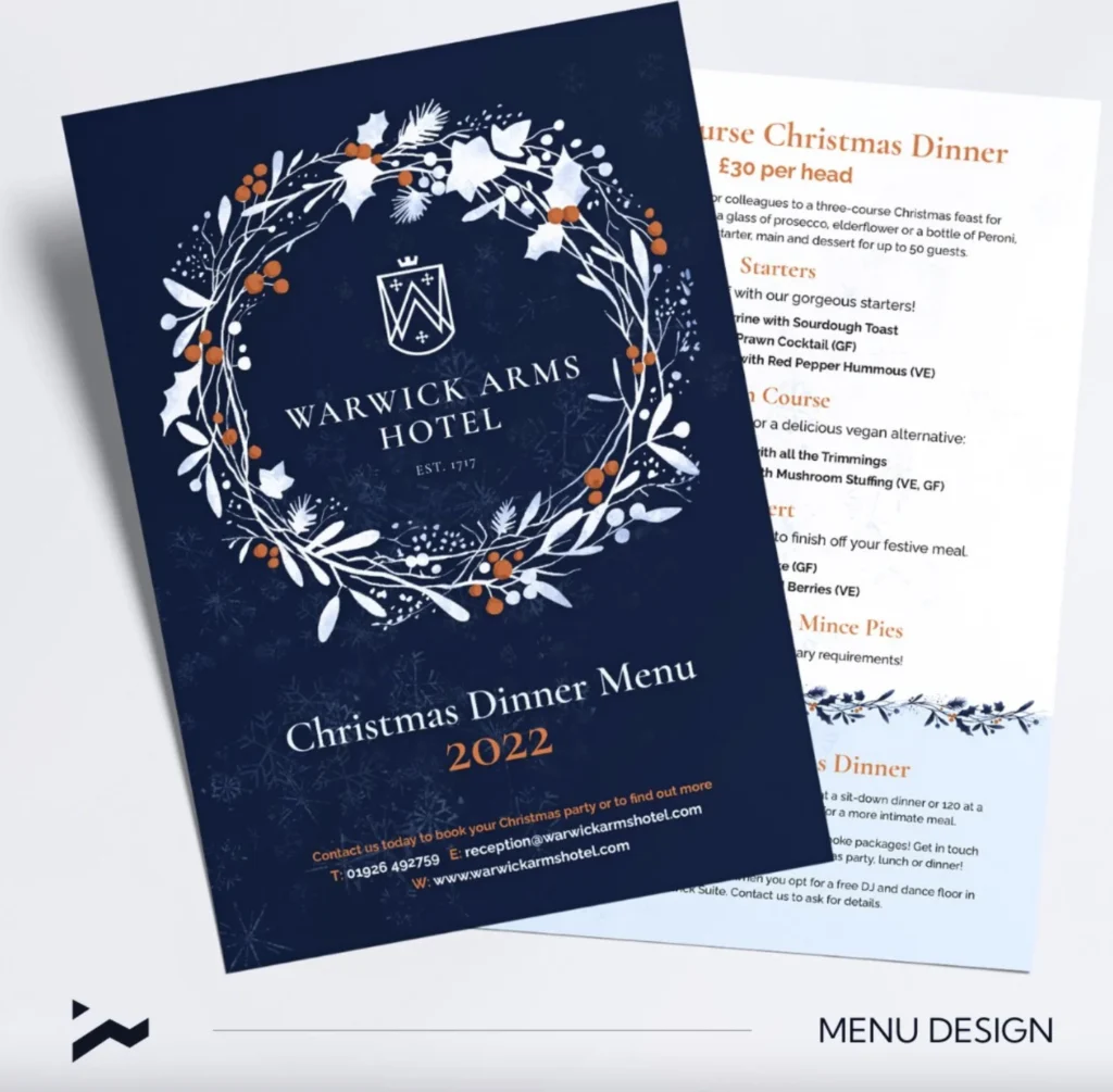 Warwick Arms Hotel Christmas Menu 2022 design, showing a navy floral cover and printed festive dinner menu.