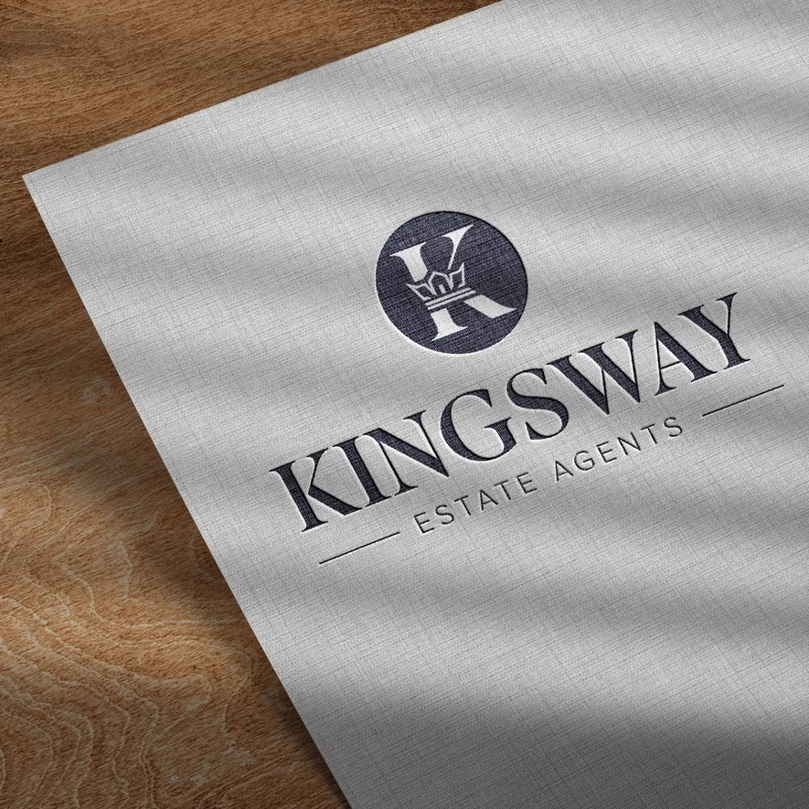 Kingsway Estate Agents logo printed on textured paper over a wooden surface